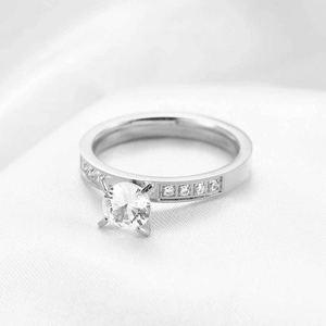 Macro shot of 3mm silver zircon ring featuring a classic four-prong solitaire setting