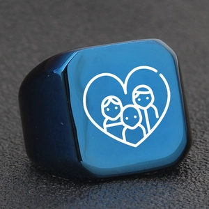 Macro view of blue square signet ring featuring a laser-engraved family heart design