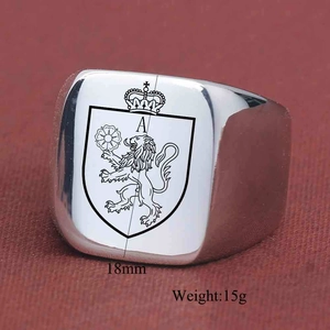 Close-up of 18mm punk signet ring featuring a lion crown shield emblem and letter A