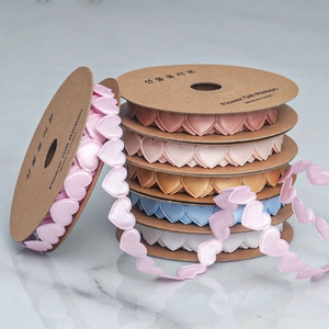Detail of assorted heart-shaped satin ribbons for gift wrapping in soft pastel colors