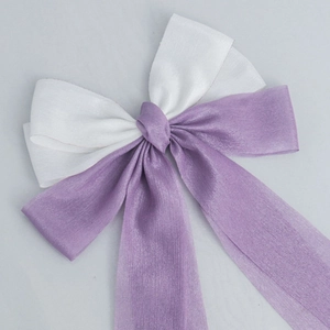 Elegant cream and purple double-layered mesh bow hair clip with long ribbon streamers
