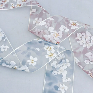 Transparent floral organza ribbon with cherry blossom print and gold glitter for DIY gifts