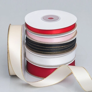 Detailed texture of polyester satin ribbons with metallic gold and silver edges in various colors