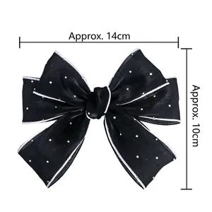 Nœud à cheveux double en organza noir orné de strass et bordures blanches