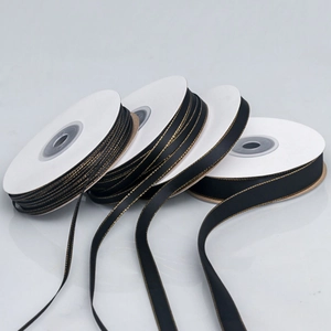 Black satin ribbons with gold stitched edges in four widths for gift wrapping
