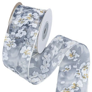 Floral organza ribbon with gold sequins for gift wrapping and DIY crafts on white background