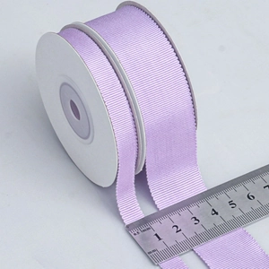 25mm lavender grosgrain ribbon roll with ribbed texture on a white spool for sewing
