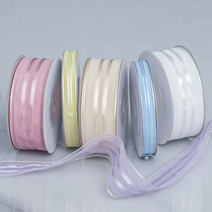 Vertical stripe organza ribbons in pastel macaron colors for gift wrapping and DIY crafts