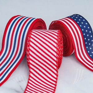 Close-up of Independence Day burlap ribbons with American star and stripe patterns
