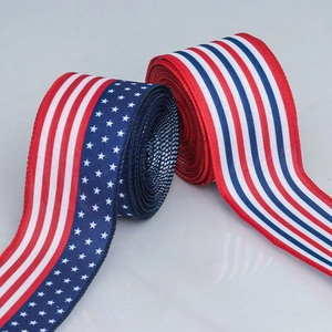 Red white striped and blue star patterned American flag ribbons for Independence Day decor