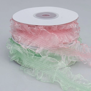 Rolls of 3cm colorful elastic ruffled lace trim in pastel pink and mint green shades