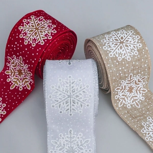 Weihnachtliche Leinenband-Rollen mit weißen Schneeflocken und gold-silbernem Glitzerdekor