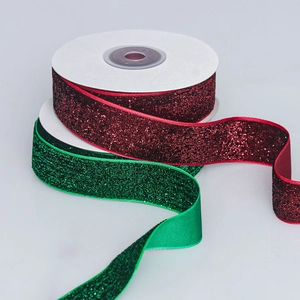 Sparkling red and green glitter velvet ribbons for Christmas gift wrapping and DIY crafts