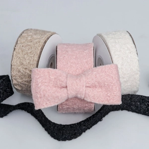 Macro view of velvet wave ribbon textures in various colors for DIY bow making and crafts