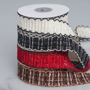 Close-up of decorative plaid ribbons with wavy edges and glitter threads in four colors