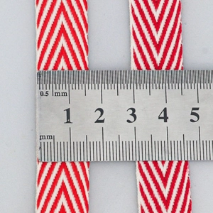 Red and white herringbone cotton ribbon measuring 25mm width for DIY craft and bows