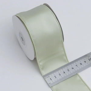 Light green 5cm satin ribbon roll with silk finish and wire edge for DIY bow gift wrapping