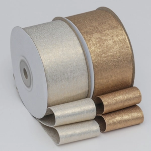 Close-up of metallic double-sided gold-stamping polyester ribbons for gift wrapping