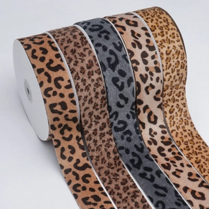 Five rolls of assorted leopard print velvet ribbons for DIY bow crafts and hair accessories