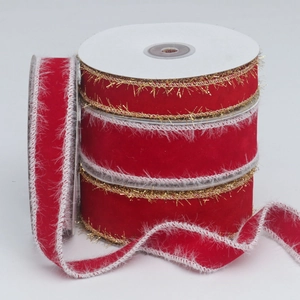 Macro detail of red velvet ribbon with gold glitter and white feather trim for DIY bows