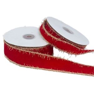 Red velvet ribbon rolls with gold metallic fringe edges for festive DIY holiday decor