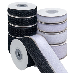 Self-adhesive hook and loop cable ties in black and white rolls for wire management
