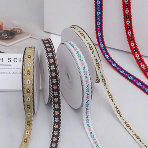 Detail showing 1cm floral embroidered ribbons with scalloped edges for DIY crafts