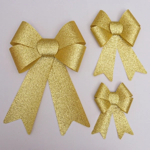 Three-piece set of golden glitter Christmas bows in various sizes for tree decoration