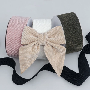 Close-up of velvet corduroy ribbons and handmade bows for DIY crafts and gift wrapping