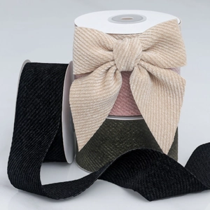 Detail of ribbed corduroy velvet ribbons in multiple colors showing soft fabric texture