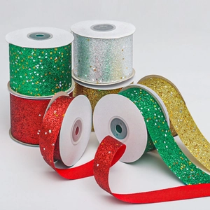 Detail of glitter ribbons with star sequins for DIY gift wrapping and hair accessories
