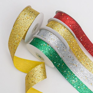 Detail of glitter ribbons with holographic star sequins in multiple vibrant colors