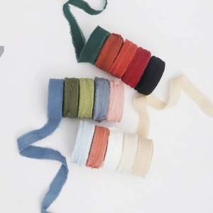 Assorted colors of 1.5cm frayed edge cotton linen ribbons for floral gift wrapping