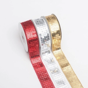 Close-up of sparkling red, silver, and gold sequin ribbons for dress trim and DIY crafts