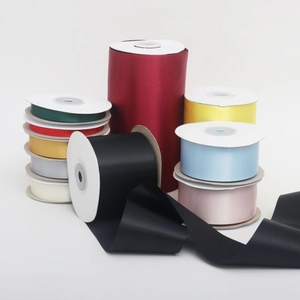 Detailed collection of colorful satin ribbons in various widths for gift boxes