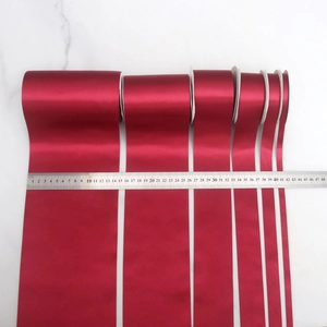 Burgundy satin ribbons in six different widths for DIY gift box floral decoration