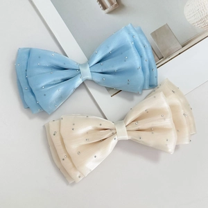 Handmade layered bow hair clips with rhinestones in light blue and cream white colors