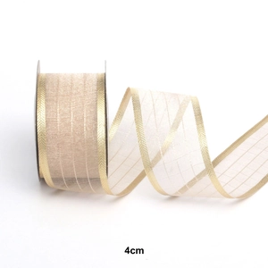 Detail view of 4cm organza ribbon with gold checkered pattern and metallic gold edges