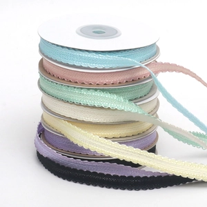 Colorful wave-edge lace ribbon rolls for DIY crafts, gift wrapping, and floral decoration