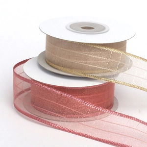 Sparkling champagne and pink mesh organza ribbon rolls for wedding gift wrapping