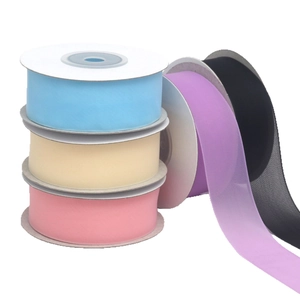 Rolls of 2.5cm sheer chiffon ribbons in various colors for DIY crafts and gift wrapping