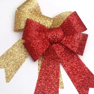 Fiocchi scintillanti rossi e oro per decorazioni natalizie e regali festivi fai-da-te