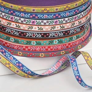 Ethnic style floral embroidery jacquard ribbons displayed in multiple vibrant colors