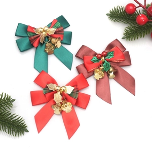 Christmas bow set with bells and holly leaves for festive holiday party tree decoration