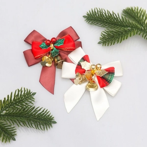 Christmas bow wreath hangers with bells, holly berries and plaid ribbons set of two