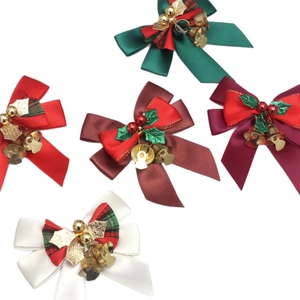 Five-piece set of satin Christmas bows with gold bells and festive holly leaf decorations