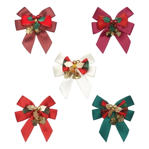 Set of five assorted Christmas bows with golden bells and festive berry accents