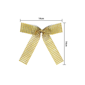 Golden plated rhinestone bow ornament for wedding decoration measuring 14x14cm