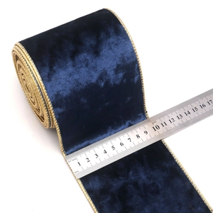 Deep blue velvet Christmas ribbon with gold wired edges on 10cm width spool decoration