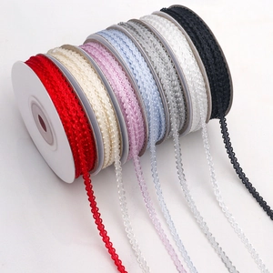 Rolls of 3mm ruffled edge polyester ribbon in 7 vibrant colors for DIY crafts and decor
